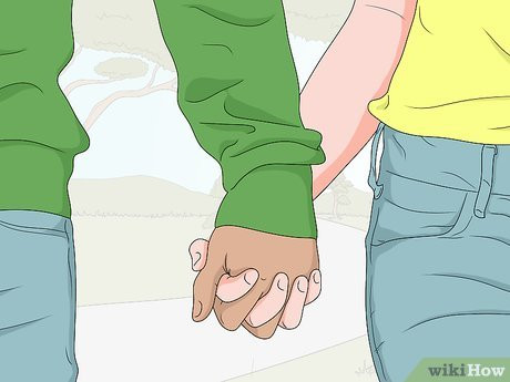 Step 1 Hold his hand when you’re side-by-side.